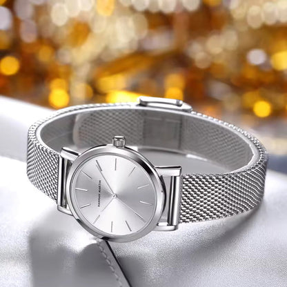 Luxurious Rose Gold Quartz Timepiece Alongside Bracelet