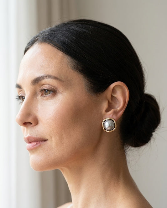 Model wearing Elegant black pearl earrings