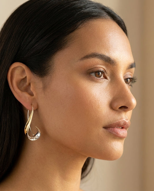 Model wearing Golden dangling vintage earrings