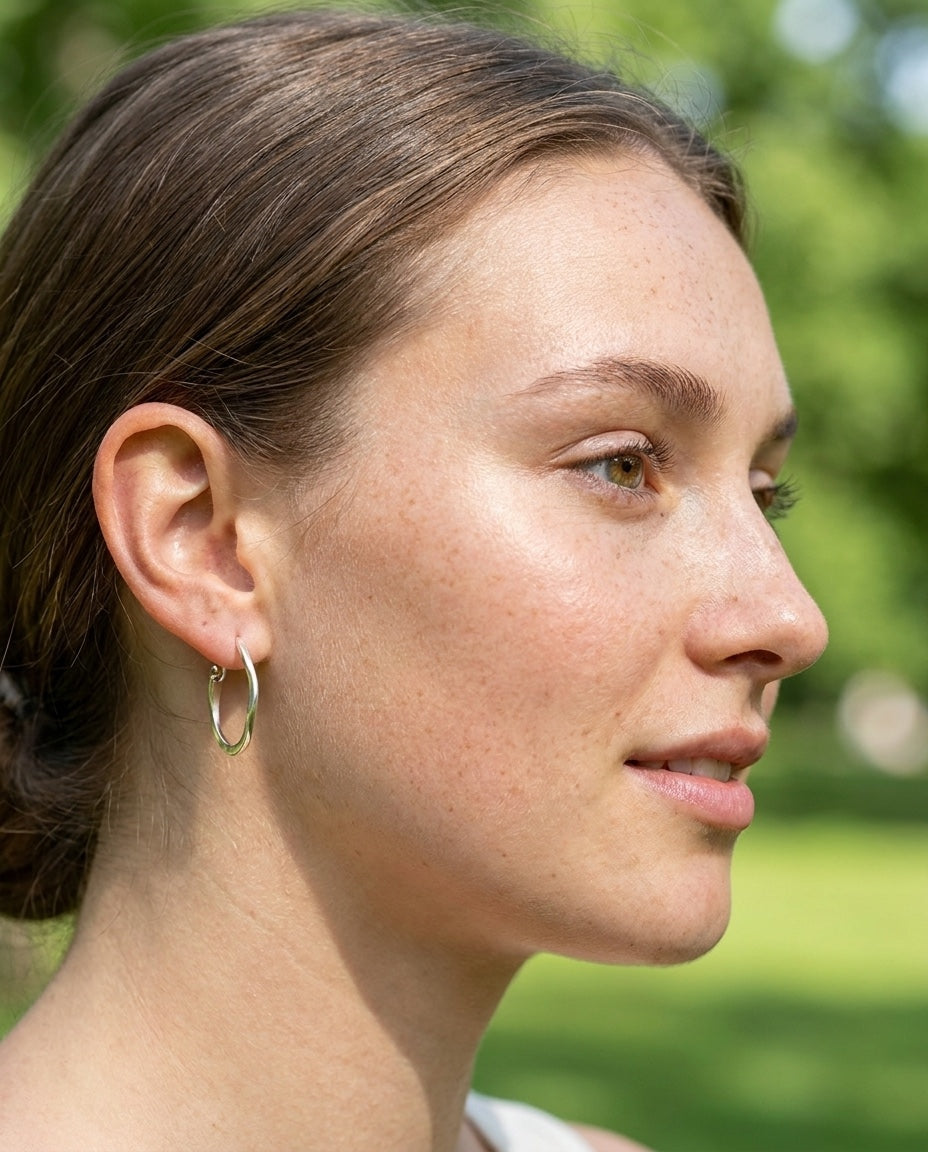Model wearing Vintage Silver Hoop Earrings